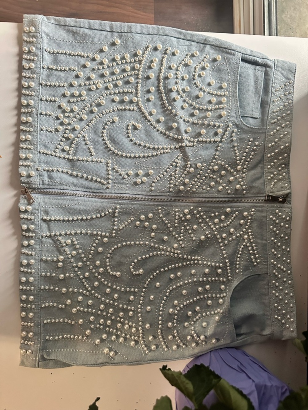 Pearl-Studded Light Blue Mini Skirt with Front Zip